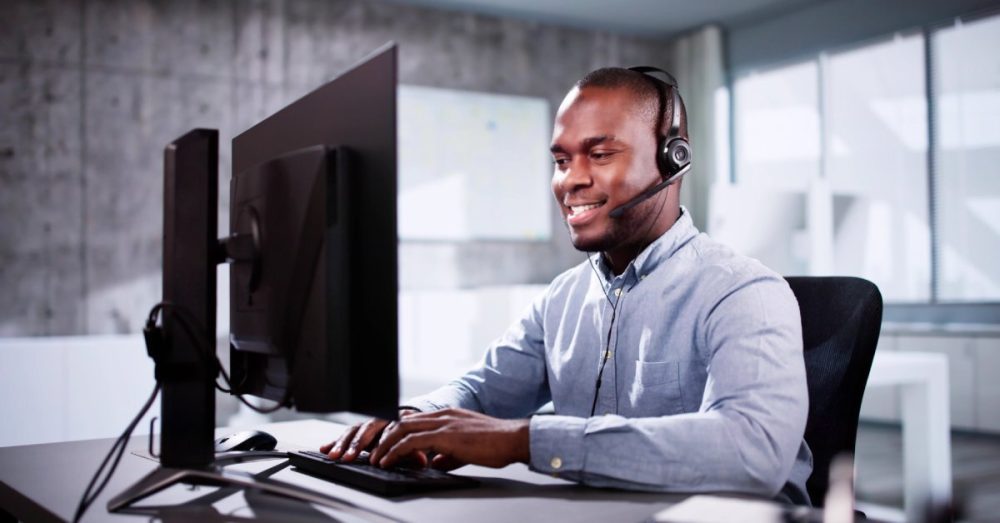 National Partitions 374191 Man Typing Office Image1